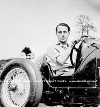 Whitney Straight in Maserati 8CM Grand Prix car cockpit at Brooklands c.1933
