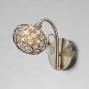 Calveley Wall Light in an Antique Brass Finish with a Decorative Crystal Shade, Switched
