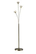 Radford 3 Light Floor Lamp in an Antique Brass Finish with Clear Glass Shades