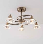 Radford 5 Light Fitting in an Antique Brass Finish with Clear Glass Shades