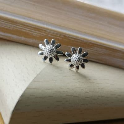 Silver flower stud earrings