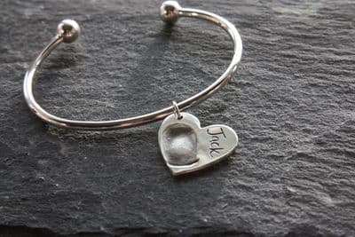 Sterling silver torque bangle with regular fingerprint charm