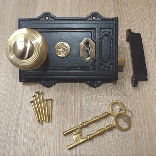 Cast Iron Davenport Rim Lock Black Antique & Beehive Reeded Rim Polished Brass Set