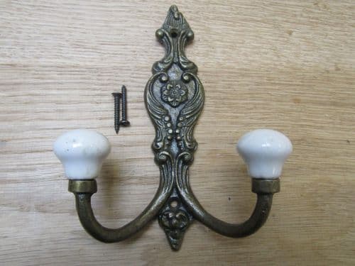 French Ornate Ceramic Hook Antique Brass