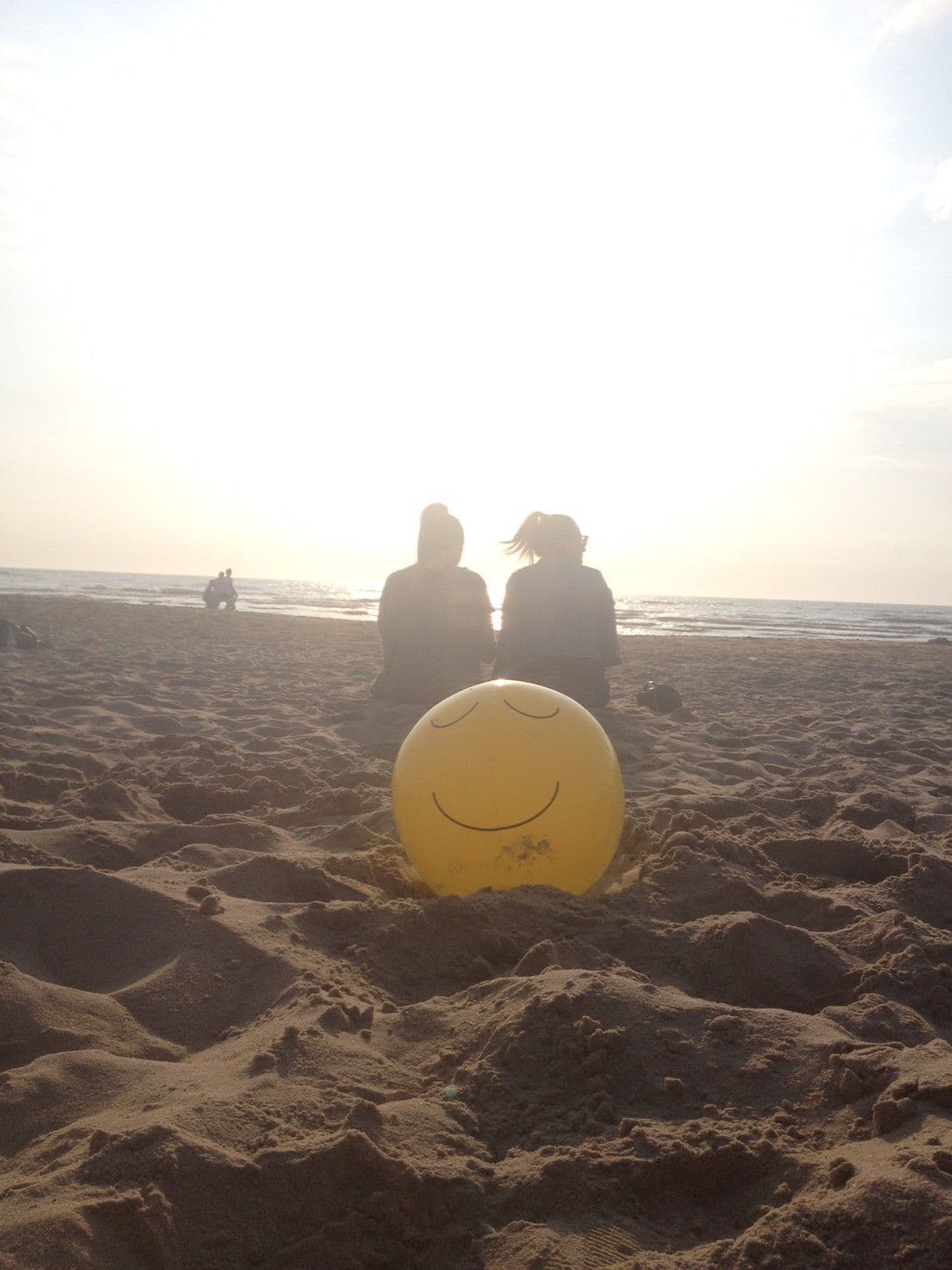 chilled emoji beach ball sand