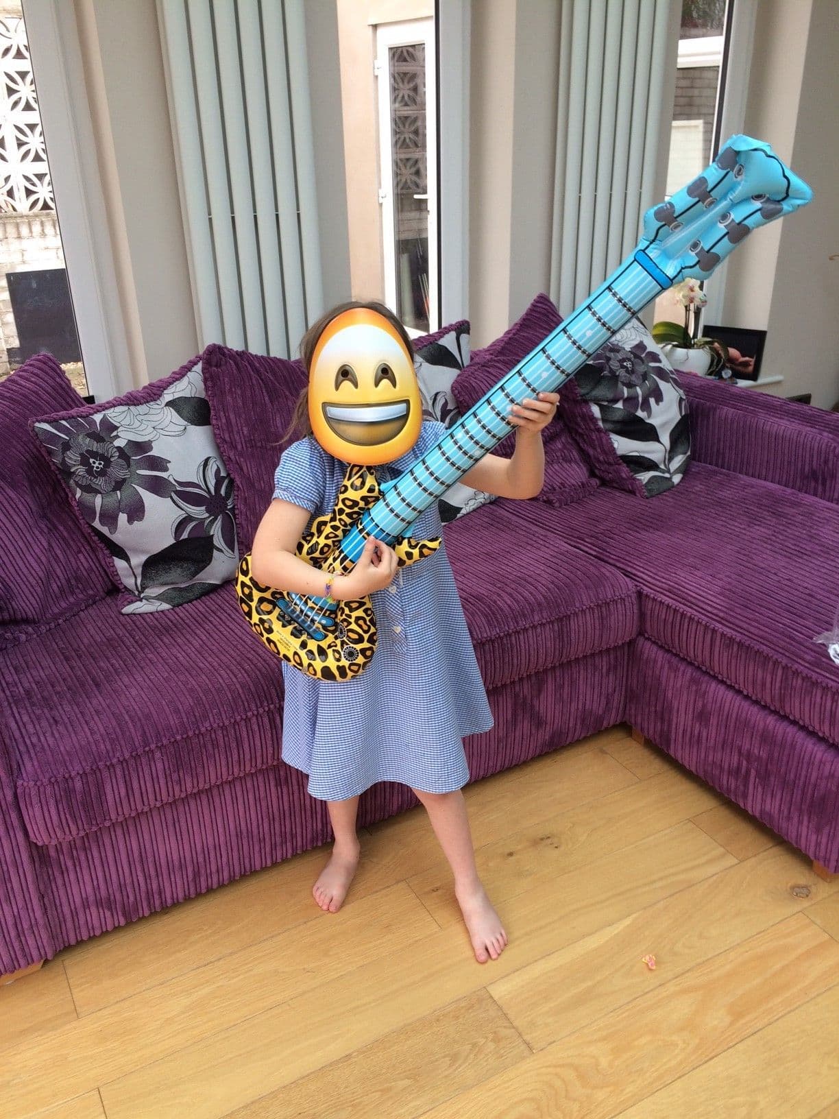 emoji mask and jungle guitar