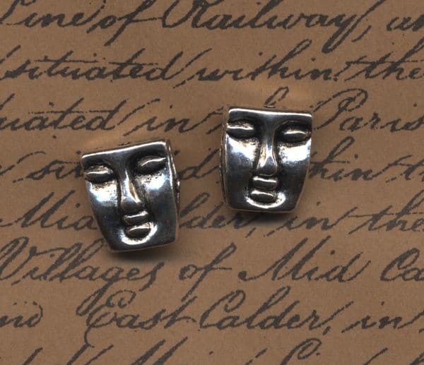2 Tibetan Silver - Face Charms