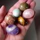 COLLECTION OF 20 POLISHED STONE AND GEMSTONE EGGS (Second hand item in box)