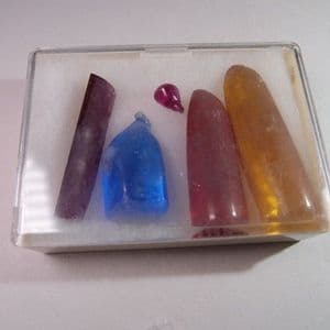 COLLECTION OF SYNTHETIC RUBIES AND SAPPHIRES