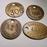 FOUR MINER'S TALLIES - From collieries in Nottinghamshire, Warwickshire, Lancashire and Derbyshire