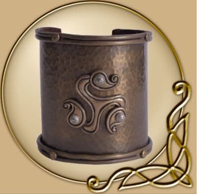 Cuff bracelet with celtic triskelion