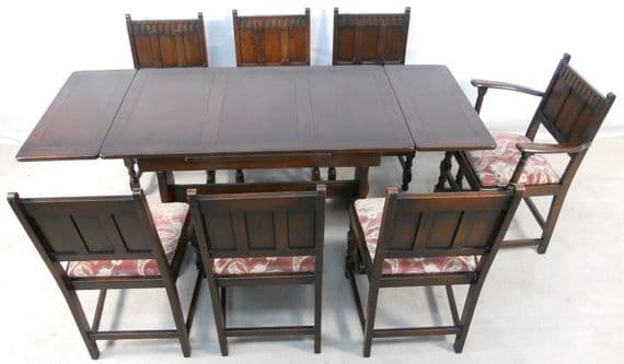 Ercol Dark Elm Extending Dining Table & Dining Chairs