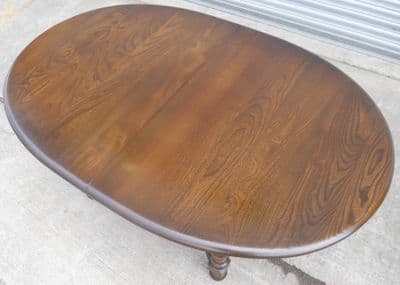 Large Oval Dark Elm Extending Dining Table to Seat Eight
