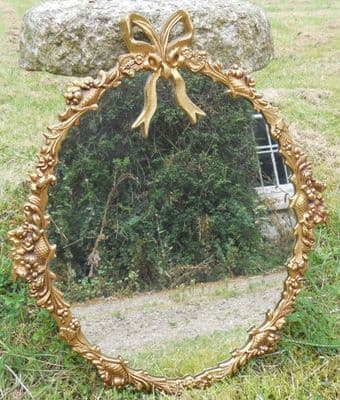 Ornate Gilt Metal Oval Wall Mirror
