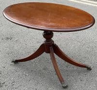 Oval Mahogany Pedestal Coffee Table with Brass Paw Feet