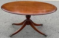 Oval Mahogany Pedestal Coffee Table with Brass Paw Feet