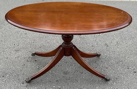 Oval Mahogany Pedestal Coffee Table with Brass Paw Feet