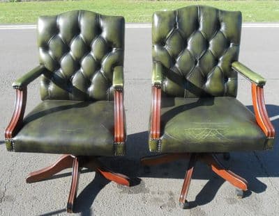Pair Button Leather Swivel Office Armchairs