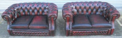 Pair Victorian Style Deep Buttoned Ox Blood Red Two Seater Chesterfield Settee's - SOLD