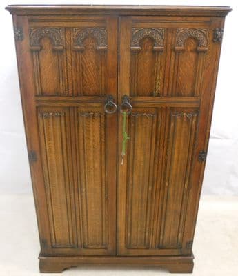 Small Carved Dark Oak Two Door Wardrobe - SOLD