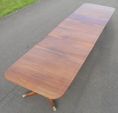 SOLD - Fourteen Feet Long Georgian Style Mahogany Triple Pillar Dining Table