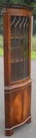 SOLD -Serpentine Front Mahogany Corner Cupboard by Reprodux
