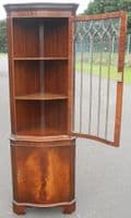 SOLD -Serpentine Front Mahogany Corner Cupboard by Reprodux