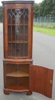 SOLD -Serpentine Front Mahogany Corner Cupboard by Reprodux