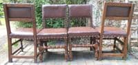 SOLD Set of Four Leather & Oak Cromwellian Style Dining Chairs