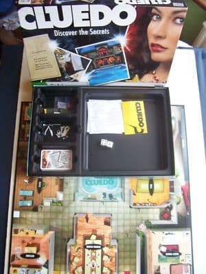Cluedo Board Game Discover the Secrets  by Parker 2008