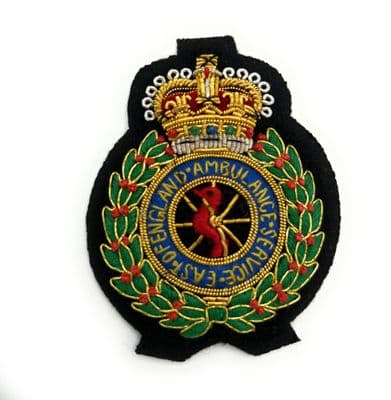 Badge Cap Gold Green on Black East Of England Ambulance Service