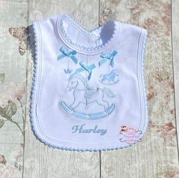 Blue Rocking Horse With Bows Bib