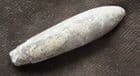 BULLET LIKE BELEMNITE FROM THE SPEETON CLAY, YORKSHIRE.