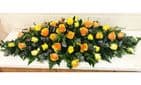 Bright Roses Coffin Spray by Paul J King Flowers Maldon