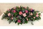 Pink and Purple Coffin Spray by Paul J King Flowers Maldon