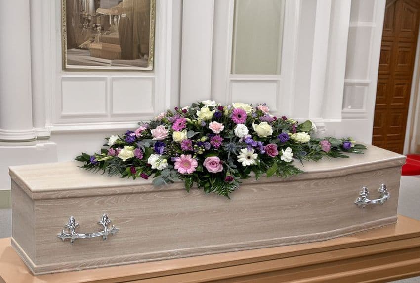 Pink Purple and Cream Coffin Spray by Paul J King Flowers Maldon