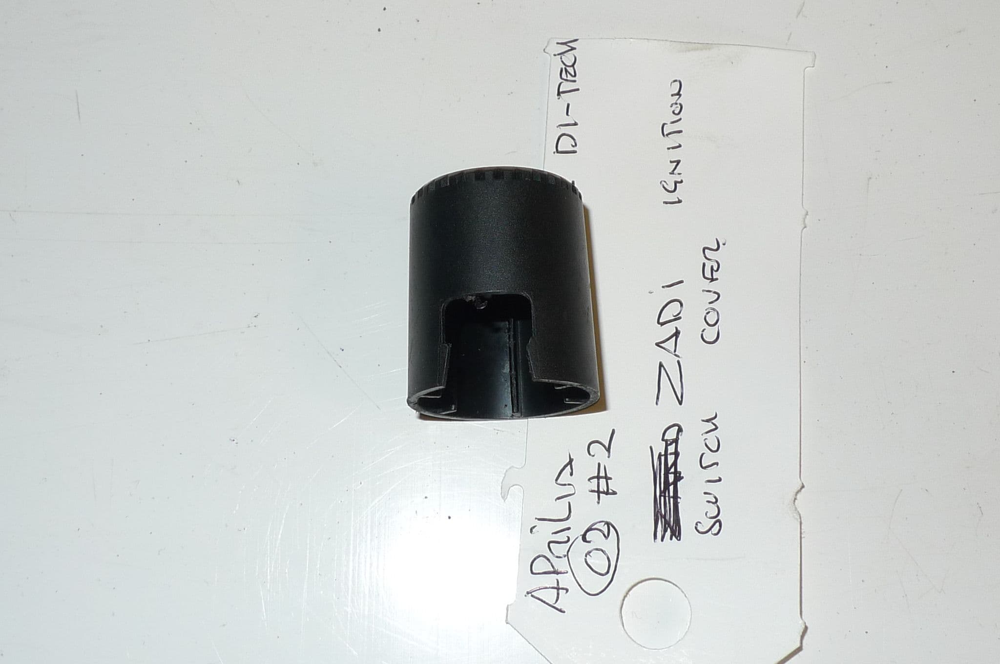 APRILIA SR50 GP1 DI-TECH ZADI IGNITION SWITCH COVER 2 LOC-A