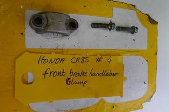 HONDA CR85 BIG WHEEL. FRONT BRAKE HANDLEBAR CLAMP #4 (LOC-A)