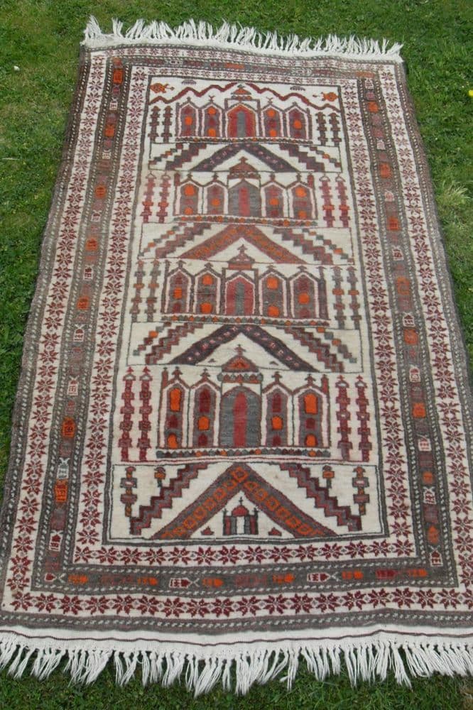 Old eastern hand woven wool rug